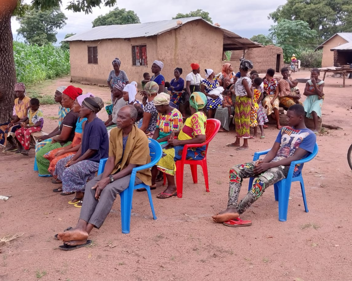 A fellowship in Sakpa, Northern Ghana, listens to a COF missionary share the gospel in their native tongue.